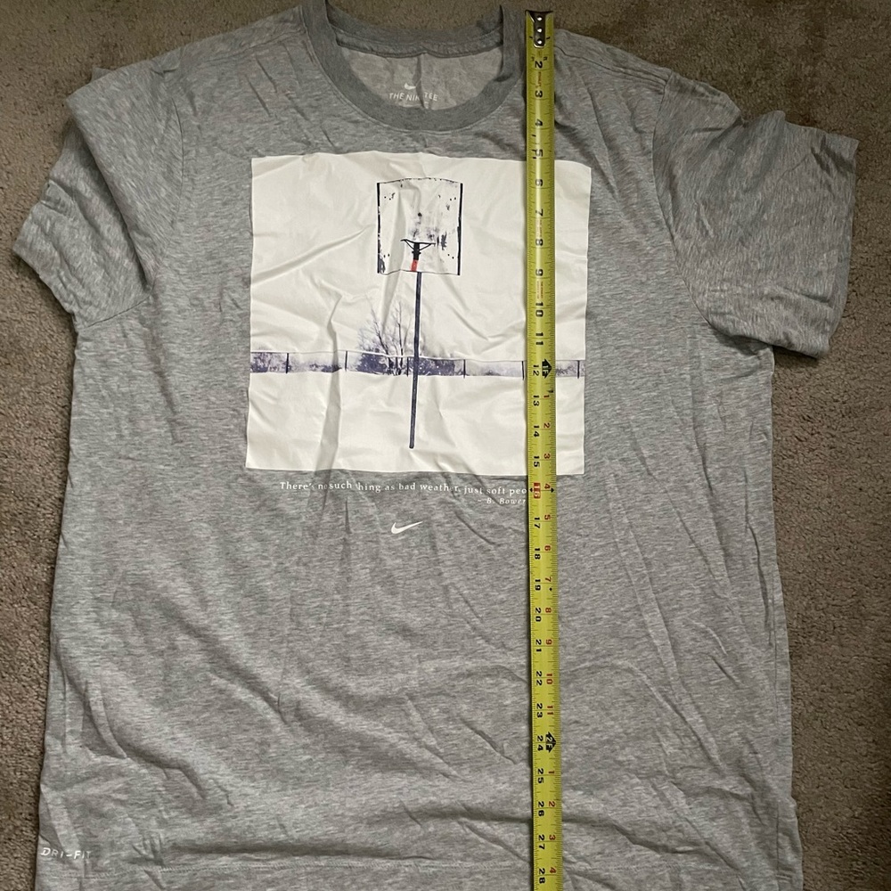 Barely worn Nike Dri-fit tee with graphic front
